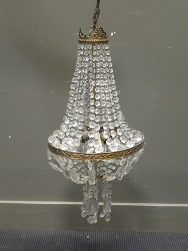 Lot 615 - A brass and glass chandelier, 90cm drop