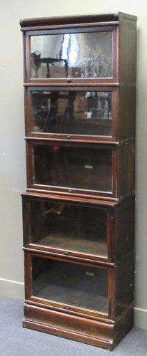 Lot 462 - A Globe Wernicke oak sectional bookcase (with...