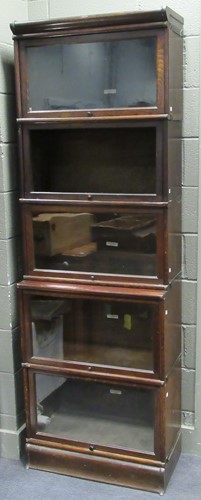 Lot 464 - A Globe Wernicke oak sectional bookcase (one...