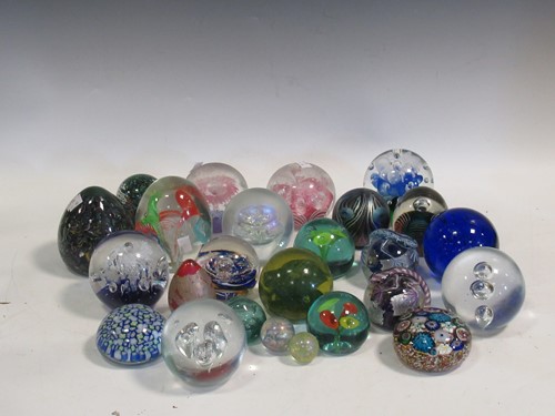 Lot 75 - A collection of various glass paperweights,...