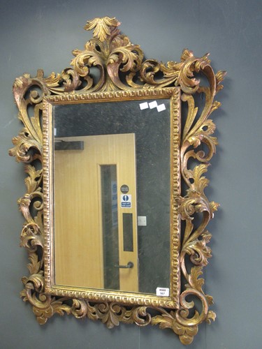 Lot 567 - Carved giltwood Florentine style carved giltwood mirror,  mirror