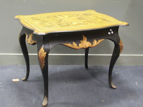 Lot 490 - An Italianate style black and gold painted centre table