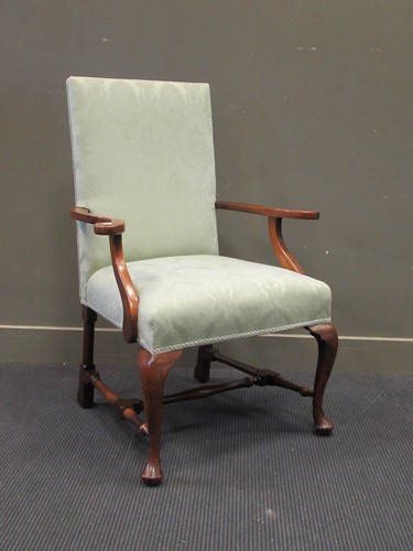 Lot 443 - A George III style armchair, the scroll end...