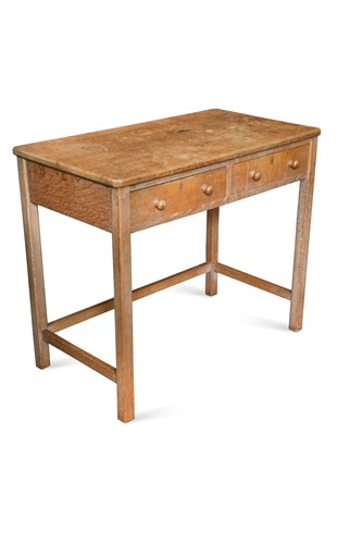 Lot 226 - Attributed to Heals, a limed oak side or writing table, circa 1930