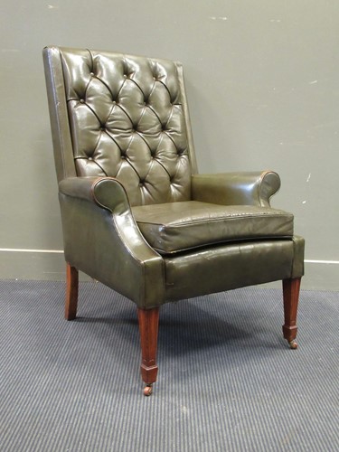 Lot 486 - Circa 1930 a buttonback green leather library...
