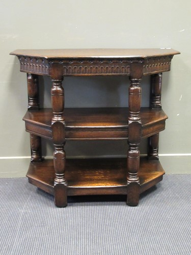 Lot 446 - A 17th century style oak canted corner three...