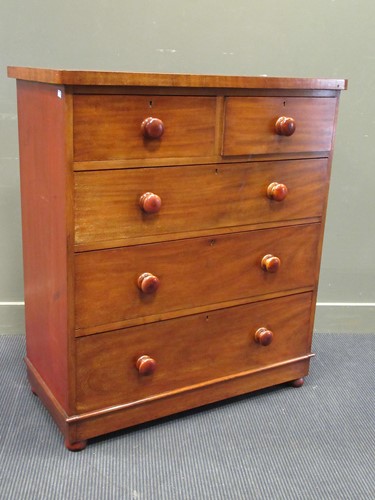 Lot 545 - A 19th century mahogany chest of two short...
