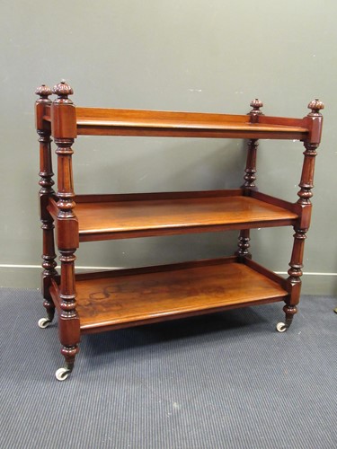 Lot 434 - A 19th century mahogany three tier buffet/...