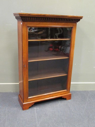Lot 446 - An early Victorian walnut bookcase with single...