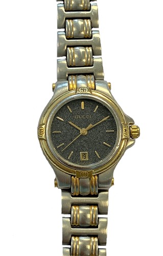 Lot 274 - Gucci - A lady's  two colour wristwatch