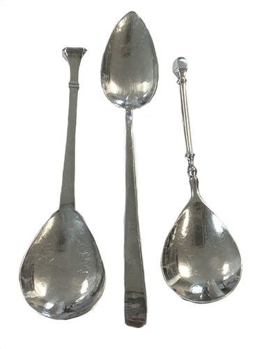 Lot 321 - Three 20th century silver conserve spoons, mark of Guild of Handicraft