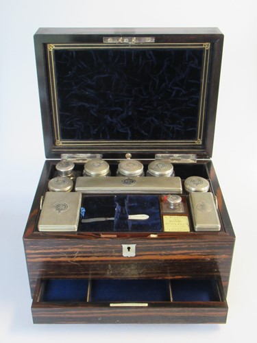 Lot 193 - A coromandel box containing a travelling...