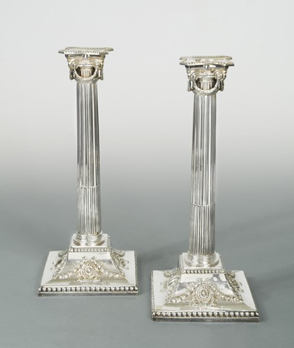 Lot 364 - A pair of silver-plated candlesticks