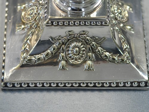 Lot 364 - A pair of silver-plated candlesticks
