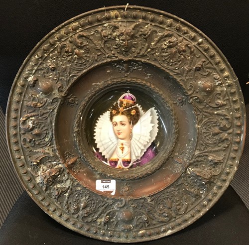 Lot 138 - A Continental embossed metal alms-type dish...