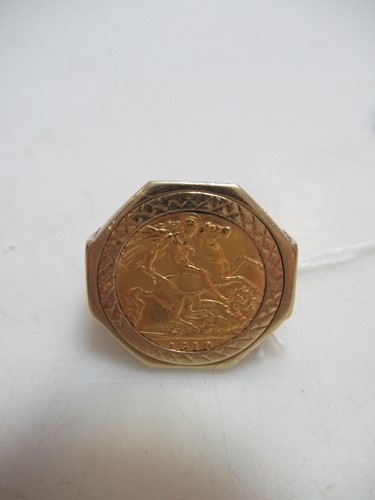 Lot 258 - A 9ct gold ring with an Edward VII half...