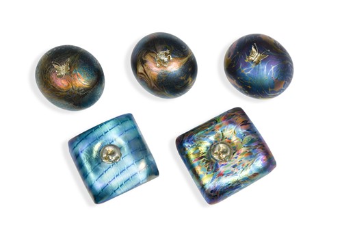 Lot 33 - Five John Ditchfield iridescent glass paperweights