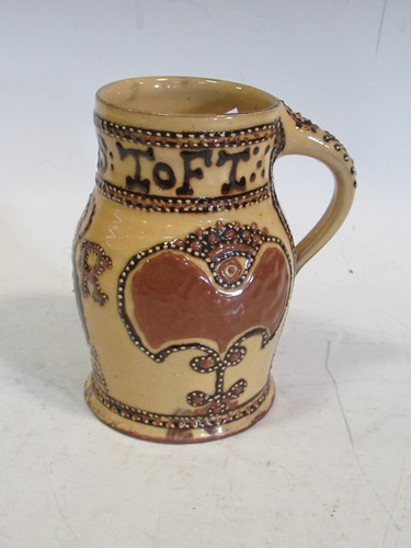 Lot 172 - 'Thomas Toft' reproduction slipware mug,...