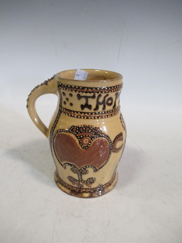 Lot 172 - 'Thomas Toft' reproduction slipware mug,...