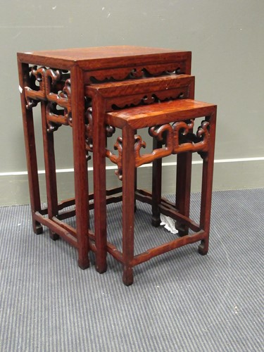 Lot 514 - A Chinese nest of three burrwood tables,...