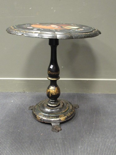 Lot 509 - A Victorian painted papier mache oval tripod...