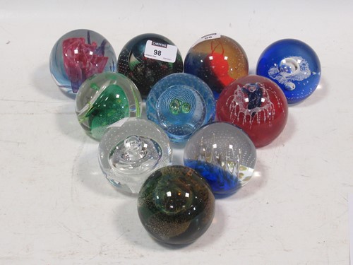 Lot 98 - Ten Caithness glass paperweights, numbered...