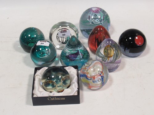 Lot 89 - Ten Caithness glass paperweights, numbered...