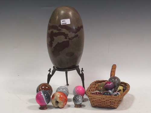 Lot 104 - A collection of polished rocks, mineral...