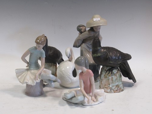 Lot 99 - Two Lladro figures, model birds and cats