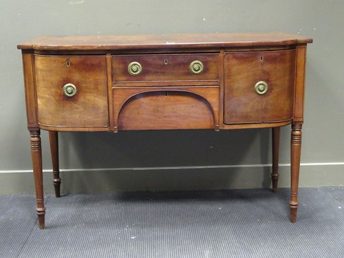 Lot 552 - An early 19th century mahogany bow front...