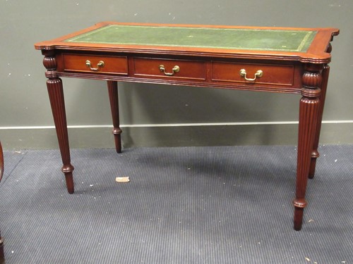 Lot 511 - A reproduction Georgian style writing table...