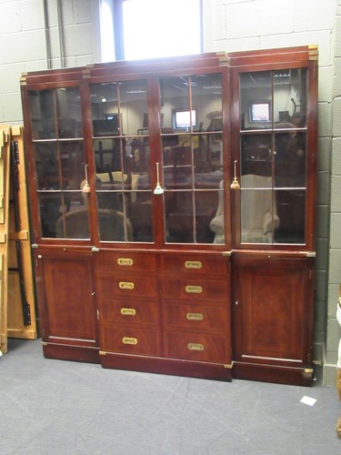 Lot 465 - A reproduction “ campaign style” bookcase 211...