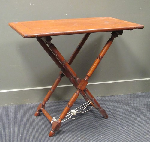 Lot 497 - A butlers tray stand with a plain top and a...