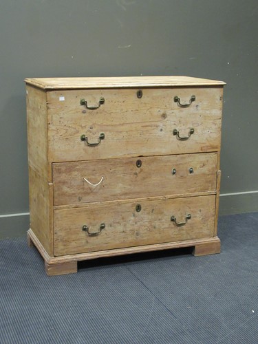Lot 458 - A 19th century pine chest with hinged top and...