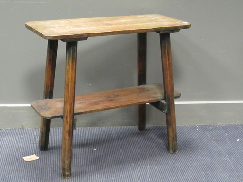 Lot 539 - A pine two tier occasional table with...