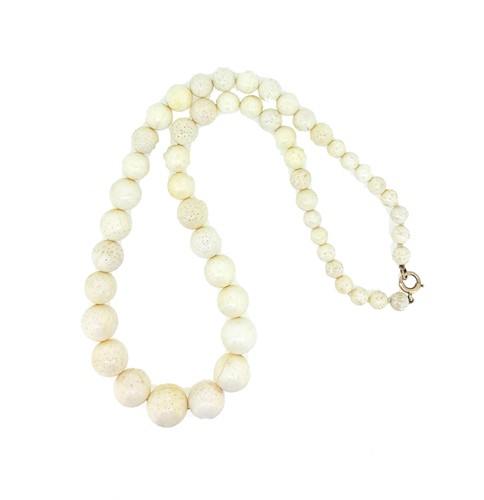 Lot 14 - A white coral bead necklace