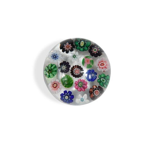 Lot 52 - A small Clichy spaced millefiori glass paperweight