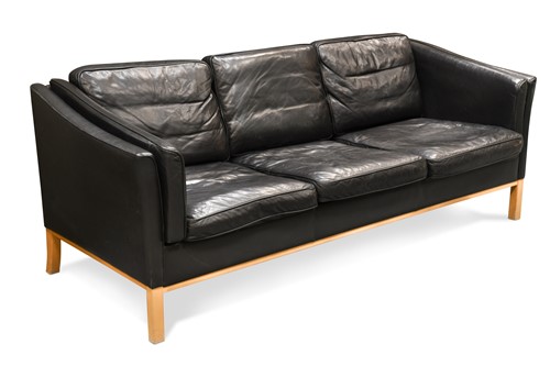 Lot 260 - A Stouby style black leather three-seat sofa
