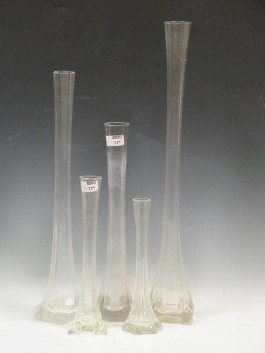 Lot 131 - A group of five clear glass tall table vases