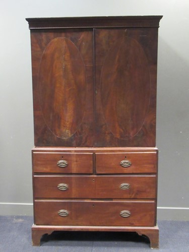 Lot 484 - A 19th century mahogany linen press 212 x 116...
