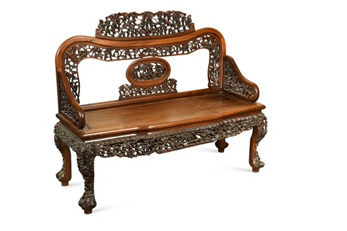 Lot 121 - A carved Chinese hardwood settee, late 19th century