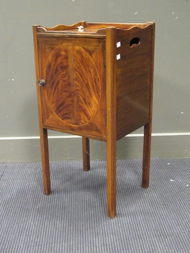 Lot 560 - An Edwardian mahogany bedside cabinet with...