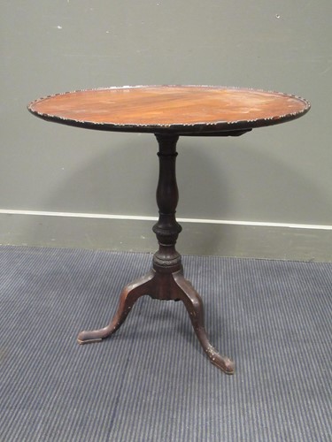 Lot 509 - A 19th century mahogany tripod table 67cm high,...