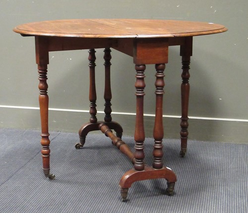 Lot 517 - A late 19th century mahogany Sutherland table...