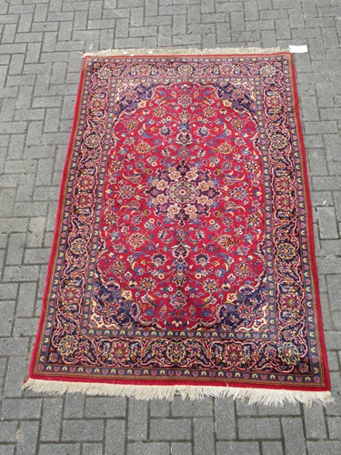 Lot 596 - A kashan carpet 226 x 142cm