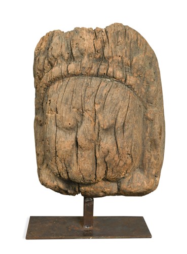 Lot 322 - A South Nepalese carved wood head of Bhairava, Newar, 17th/18th century