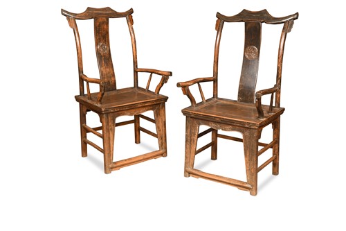 Lot 329 - A pair of  Chinese elm wood yoke back armchairs, Qing Dynasty, 18/19th century