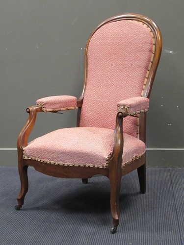 Lot 562 - A 19th century French reclining Voltaire padded arm chair