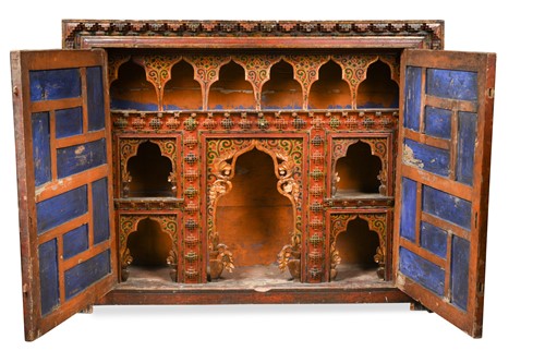 Lot 176 - A Tibetan carved and painted private wall shrine, 18th century