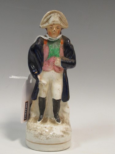 Lot 130 - A Staffordshire pottery figure of Napoleon circa 1860